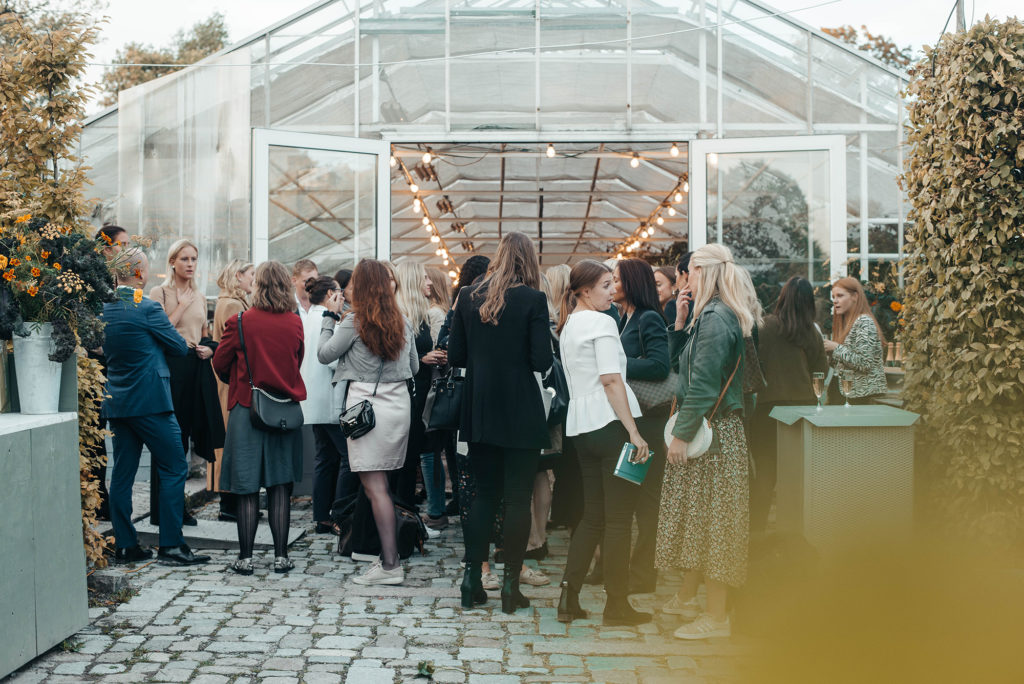 people mingle at event venue