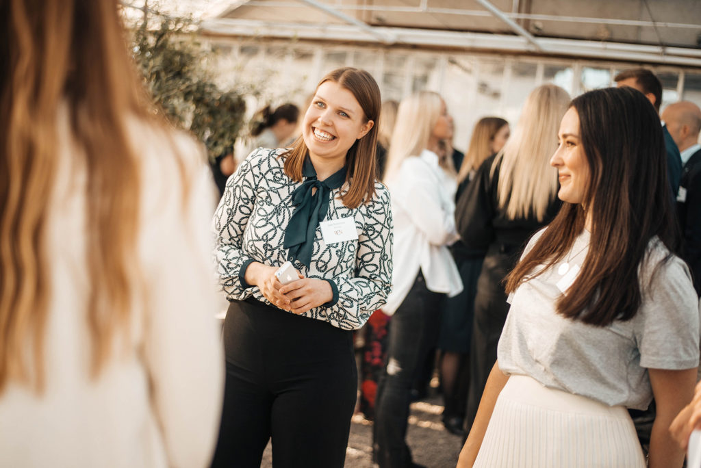 people mingle at event